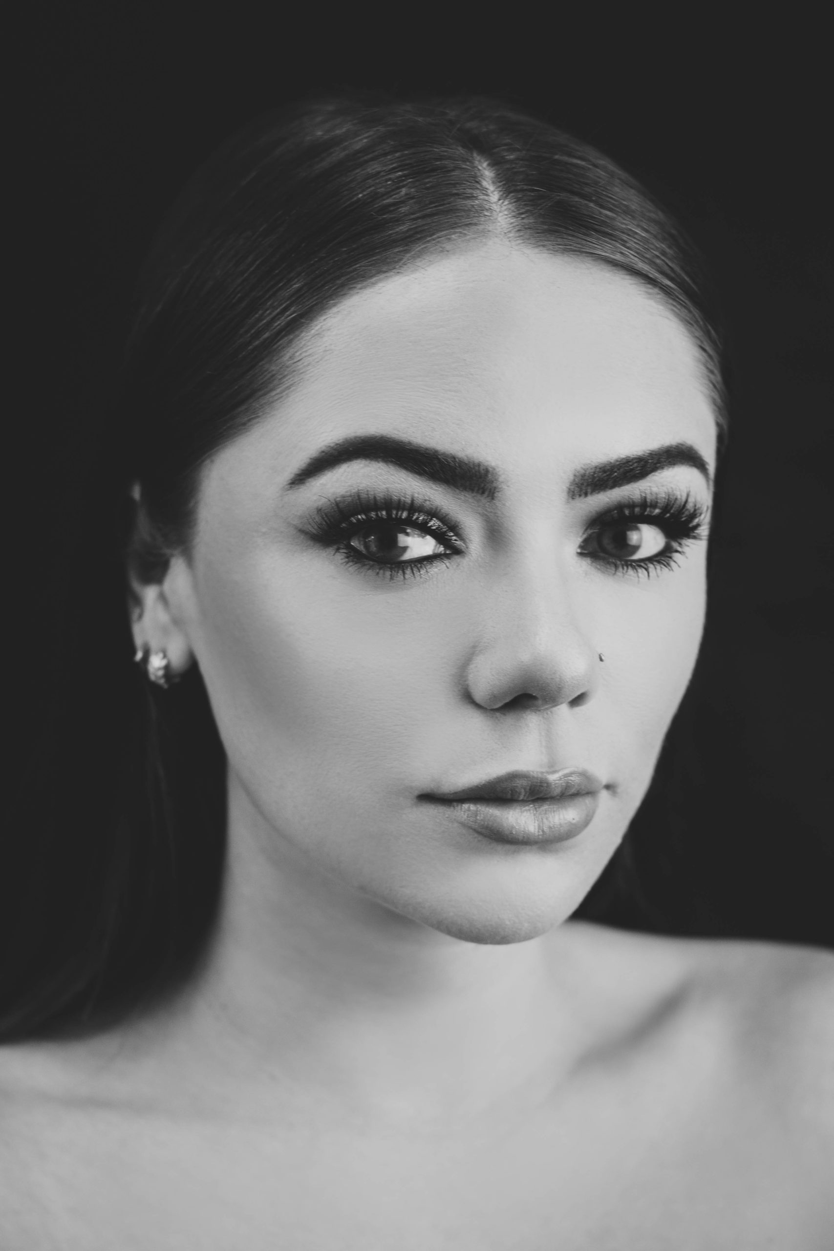 black and white portrait of pretty woman with big eyes